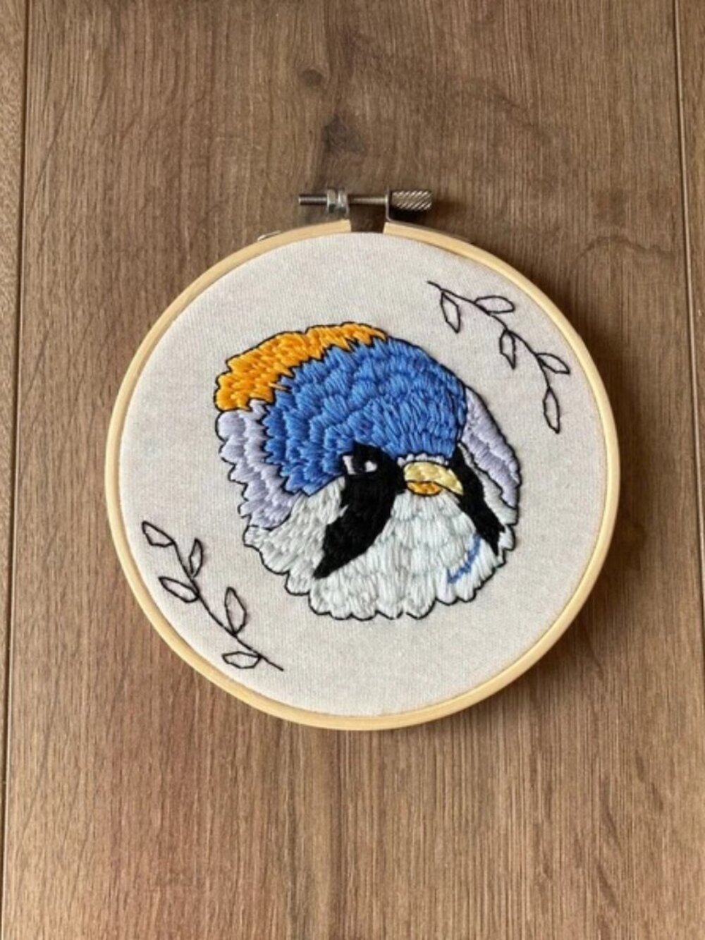 Bluebird Embroidery Art: Hand-Embroidered Wall Hanging of Bearded Reedling Bird